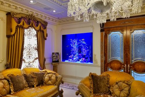 ornate Russian sitting room is completed by its custom marine aquarium